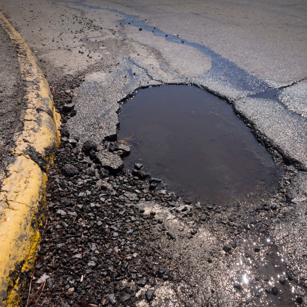 pothole in street surface